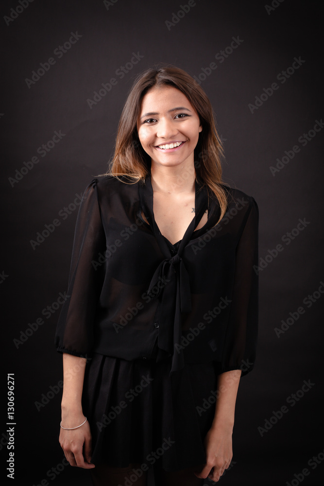 Beautiful woman doing different expressions in different sets of clothes: smile Beautiful woman doing different expressions in different sets of clothes: smile