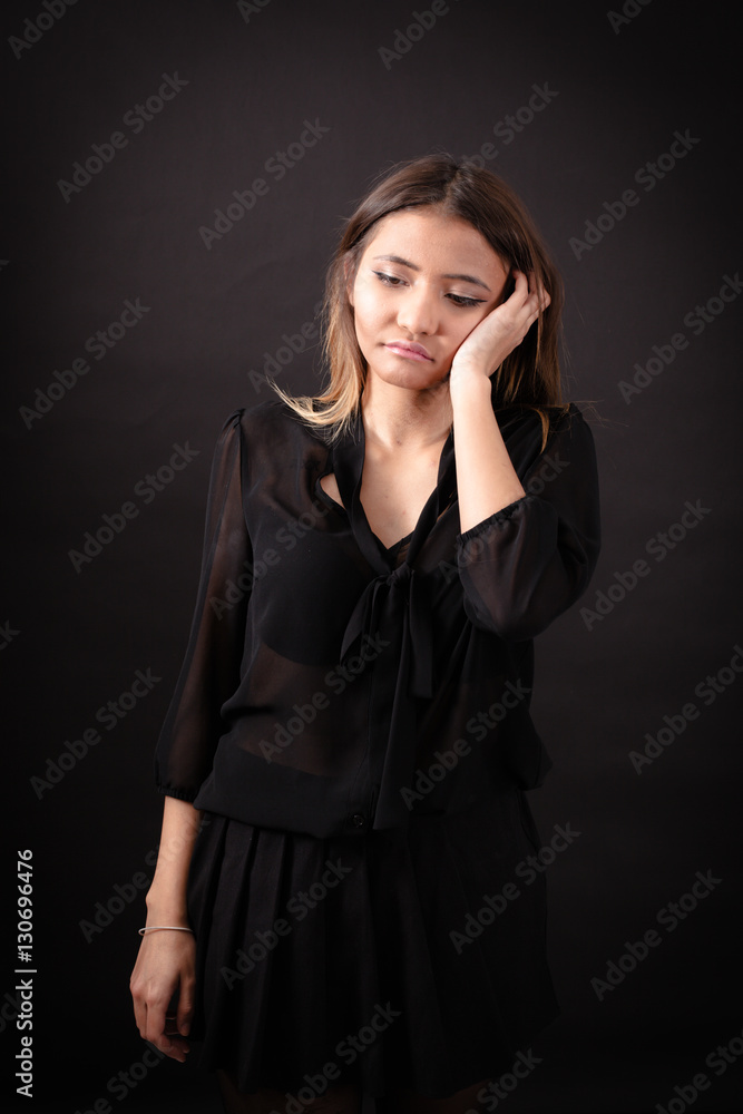 Beautiful woman doing different expressions in different sets of clothes: tired Beautiful woman doing different expressions in different sets of clothes: tired