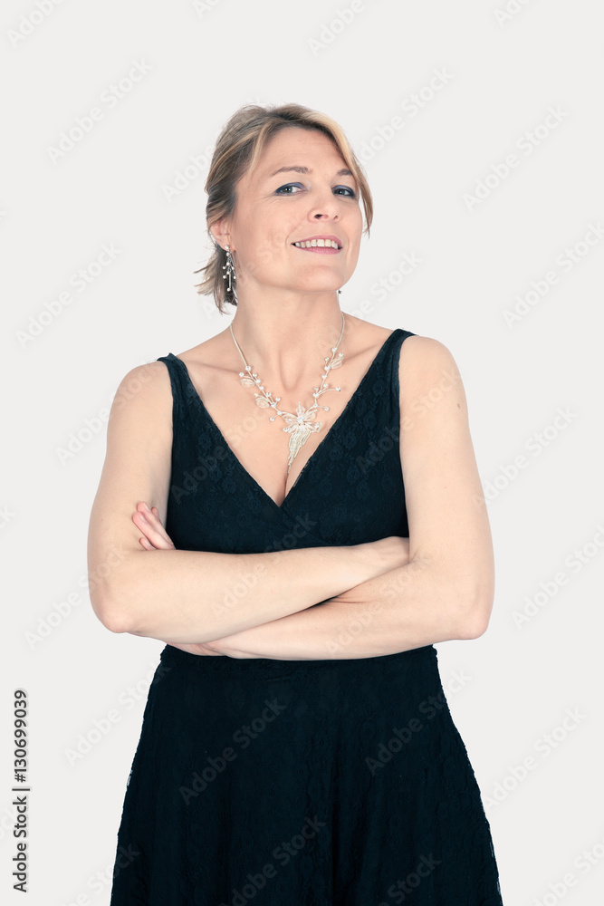 Beautiful woman doing different expressions in different sets of clothes: arms crossed Beautiful woman doing different expressions in different sets of clothes: arms crossed