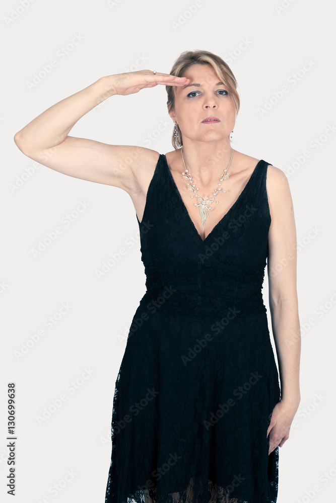 Beautiful woman doing different expressions in different sets of clothes: at attention Beautiful woman doing different expressions in different sets of clothes: at attention
