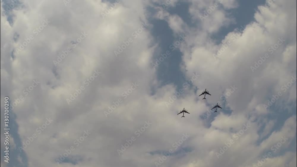 The three bombers are flying at an Airshow The three bombers are flying at an Airshow
