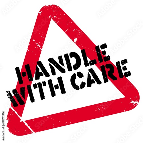 Handle with care rubber stamp. Grunge design with dust scratches. Effects can be easily removed for a clean, crisp look. Color is easily changed.