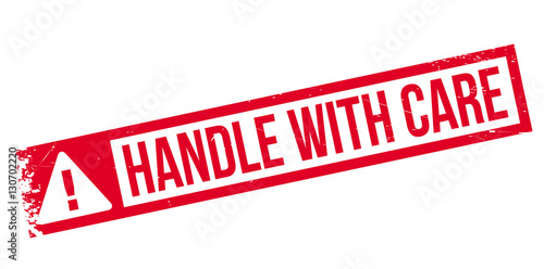 Handle with care rubber stamp. Grunge design with dust scratches. Effects can be easily removed for a clean, crisp look. Color is easily changed.