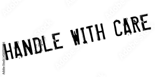 Handle with care rubber stamp. Grunge design with dust scratches. Effects can be easily removed for a clean, crisp look. Color is easily changed.
