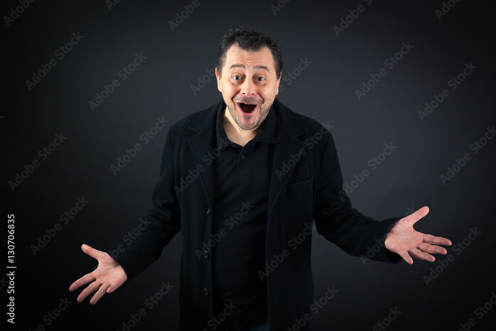 Handsome man doing different expressions in different sets of clothes: surprise Handsome man doing different expressions in different sets of clothes: surprise
