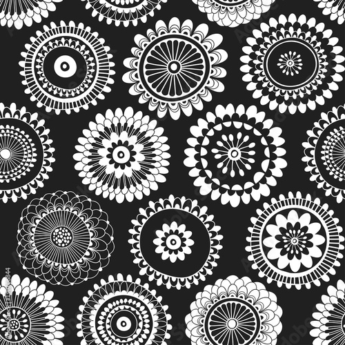 Seamless pattern with abstract doodle flowers. Black and white vector illustration.