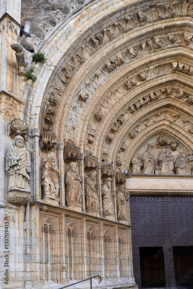 Entrance of the gothic cathedral of Santa Maria in Castello d Empuries, Girona province, Catalonia, Spain