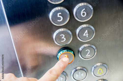 In the elevator floor buttons