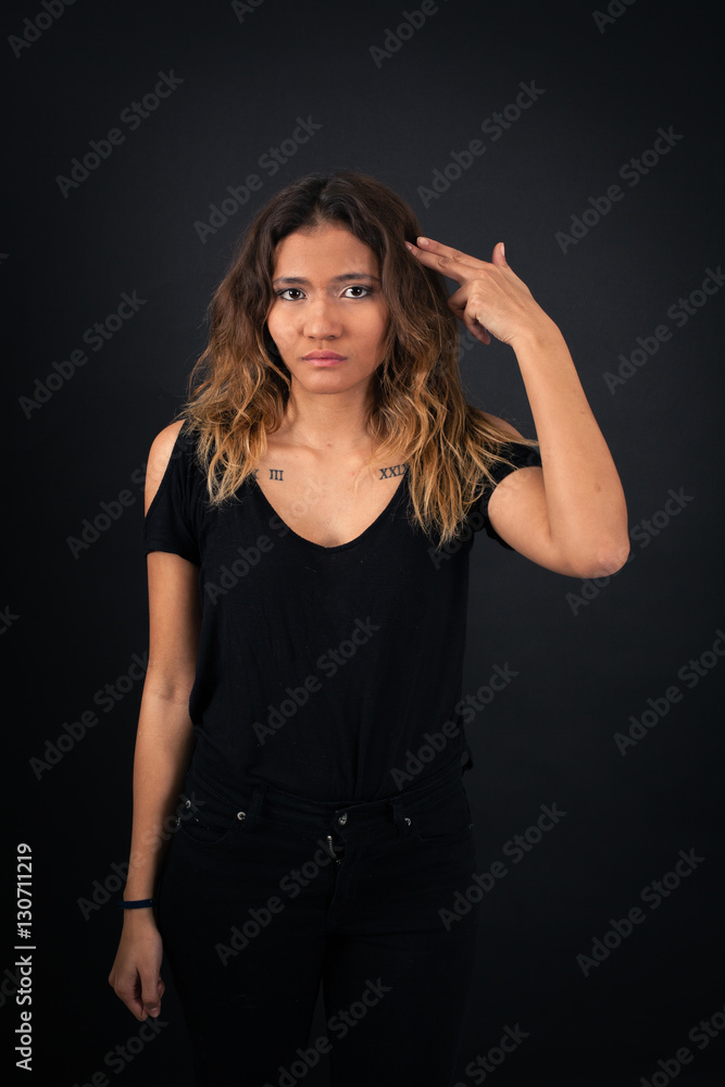 Beautiful woman doing different expressions in different sets of clothes: suicide Beautiful woman doing different expressions in different sets of clothes: suicide