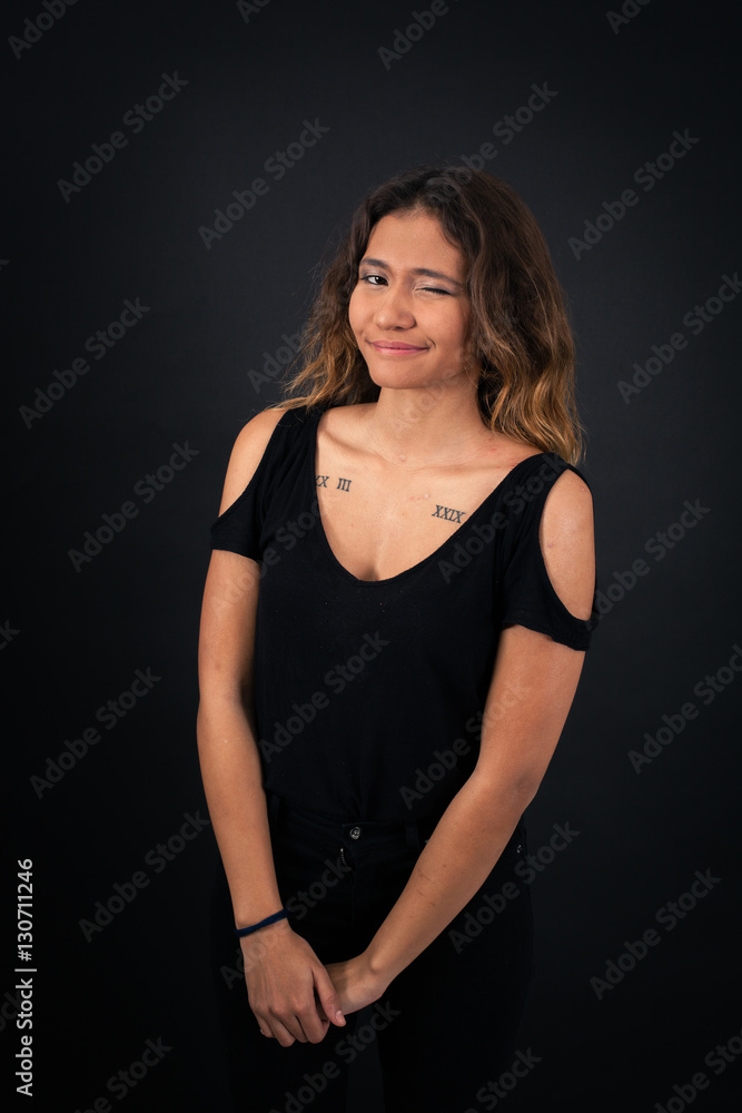 Beautiful woman doing different expressions in different sets of clothes: blink Beautiful woman doing different expressions in different sets of clothes: blink