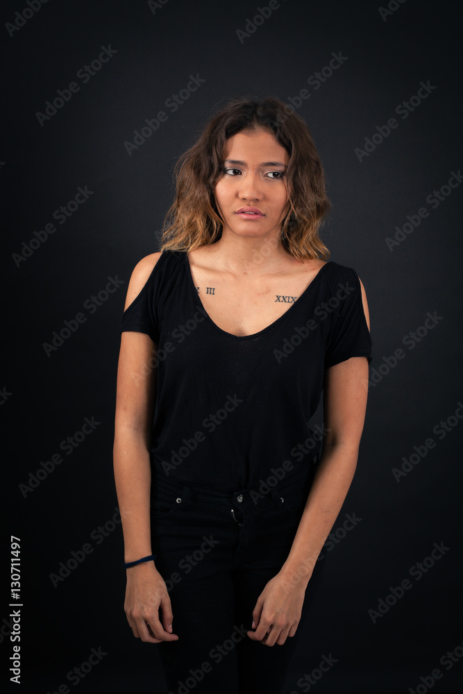 Beautiful woman doing different expressions in different sets of clothes: worried