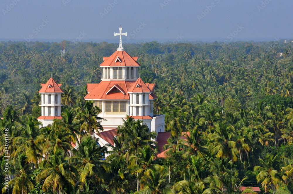 catholic church in Kerala India and abundance of coconut palm trees