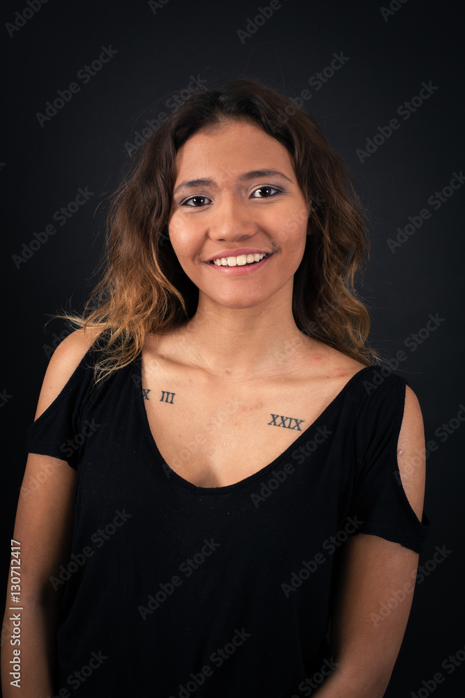 Beautiful woman doing different expressions in different sets of clothes: smile Beautiful woman doing different expressions in different sets of clothes: smile