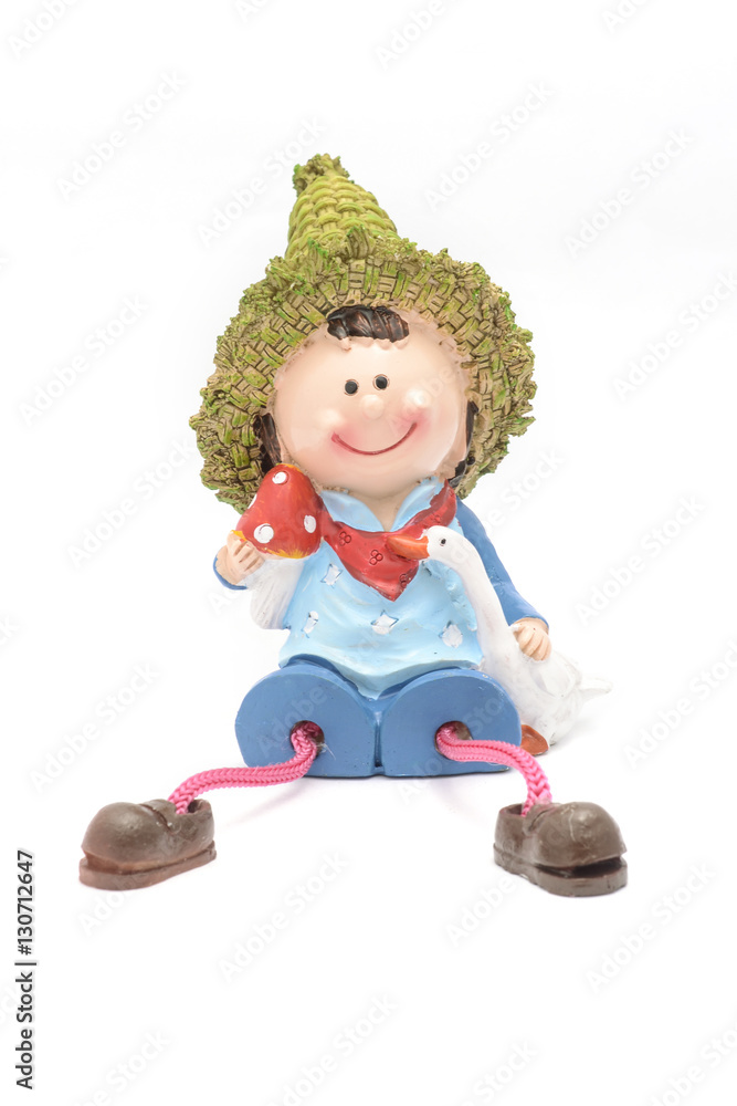 figurine boy in hat and rope legs isolated on white figurine boy in hat and rope legs isolated on white
