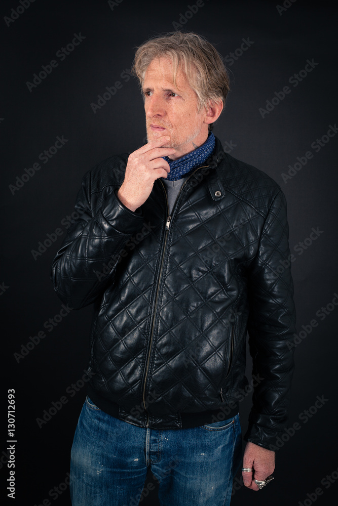 Handsome man doing different expressions in different sets of clothes: think Handsome man doing different expressions in different sets of clothes: think