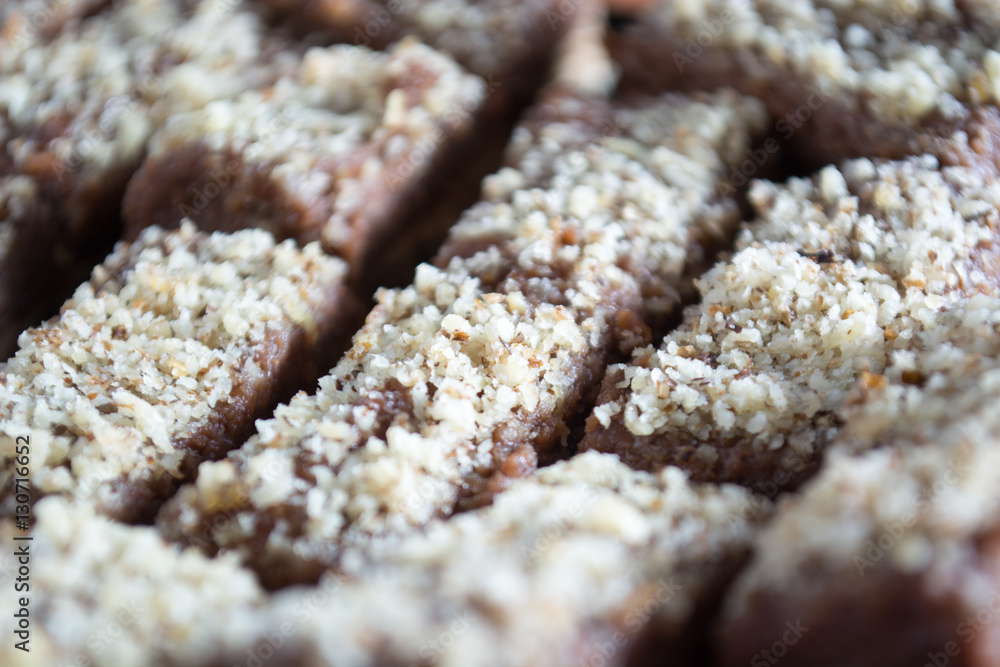 Chocolate cake with walnut cut into squares Chocolate cake with walnut cut into squares