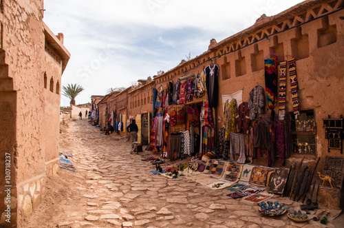 Fortified village Ait Benhaddou with shops on street © sewu