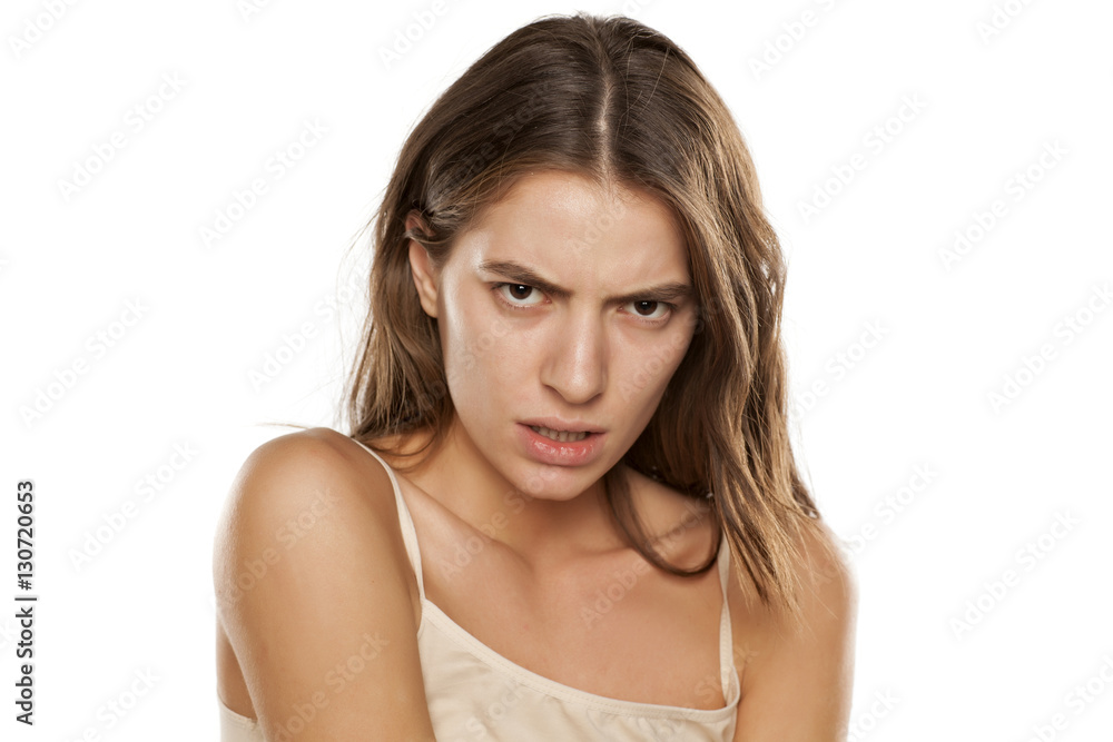 young angry woman with long hair and without makeup young angry woman with long hair and without makeup