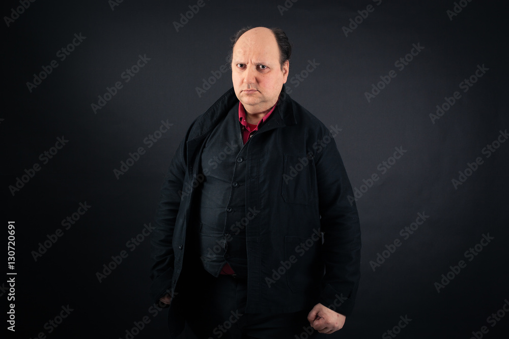 Handsome man doing different expressions in different sets of clothes: angry Handsome man doing different expressions in different sets of clothes: angry