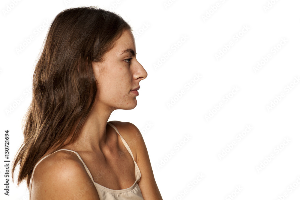 profile of young beautiful woman with long hair and without makeup profile of young beautiful woman with long hair and without makeup