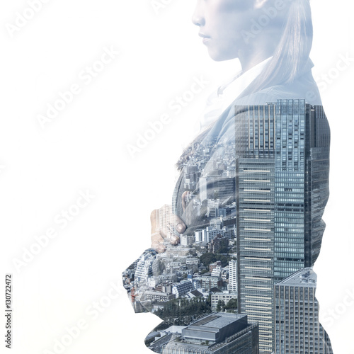 double exposure of business woman and modern building