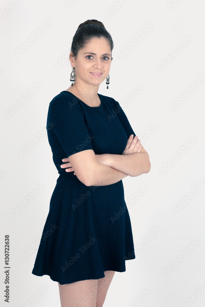 Beautiful woman doing different expressions in different sets of clothes: arms crossed Beautiful woman doing different expressions in different sets of clothes: arms crossed