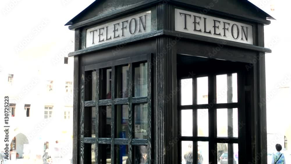 Closeup on a traditional phone booth Closeup on a traditional phone booth