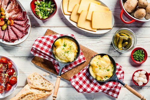 Canvas Print Delicious restaurant dinner with Swiss raclette
