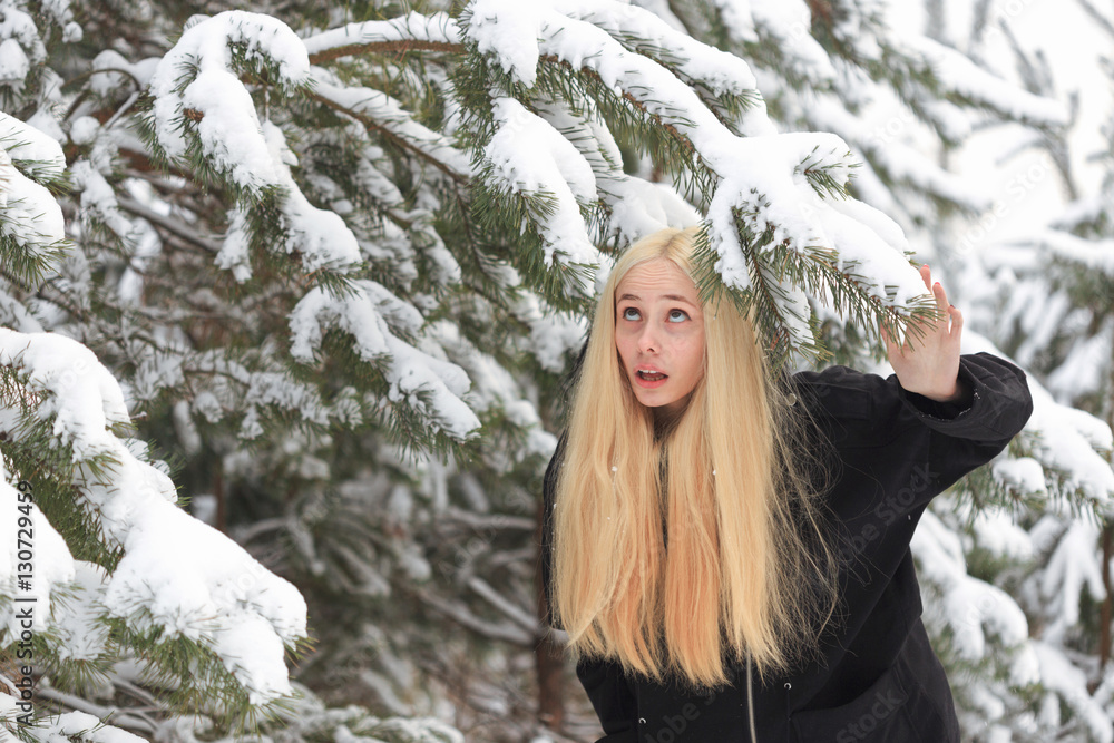 girl in a snowy winter forest. slum girl in a snowy winter forest. slum