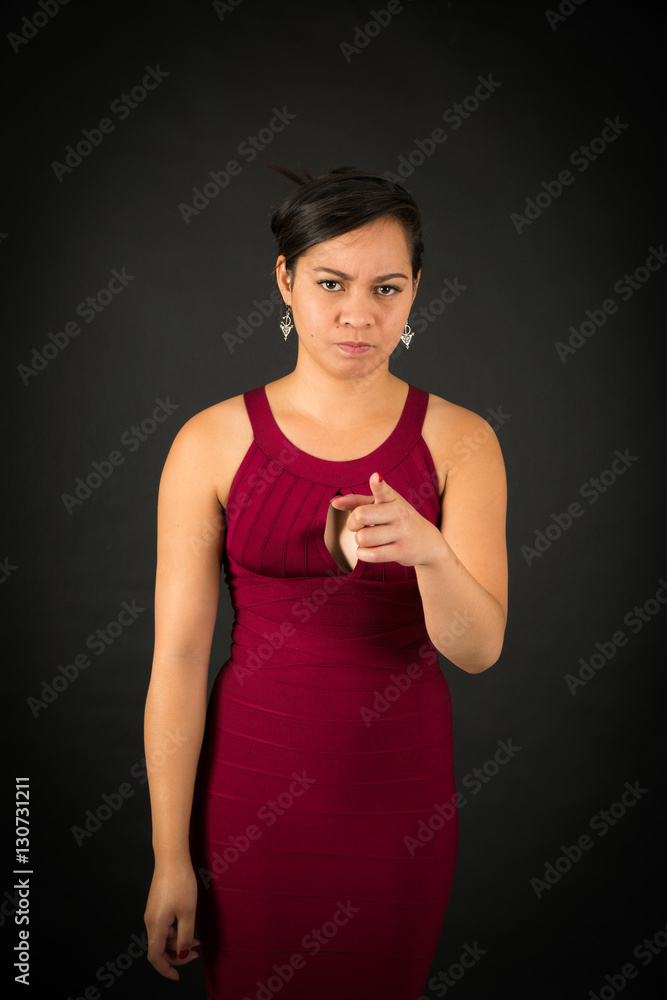 Beautiful woman doing different expressions in different sets of clothes: suspicion Beautiful woman doing different expressions in different sets of clothes: suspicion
