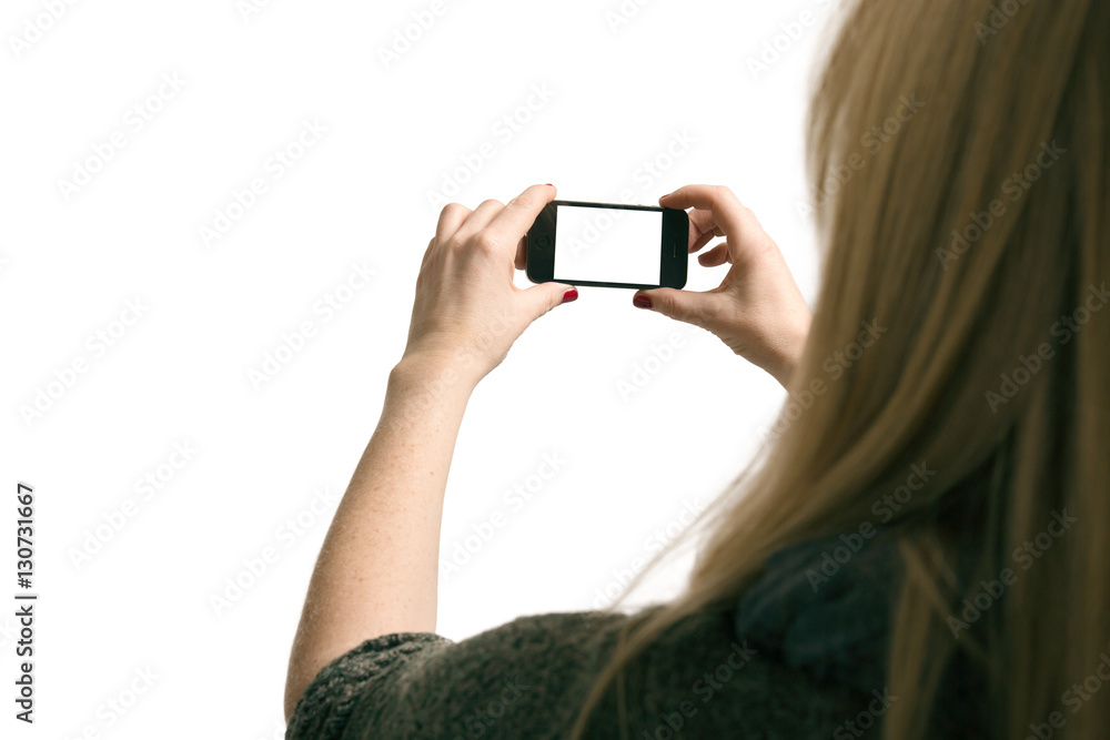 Woman holding smartphone with white display