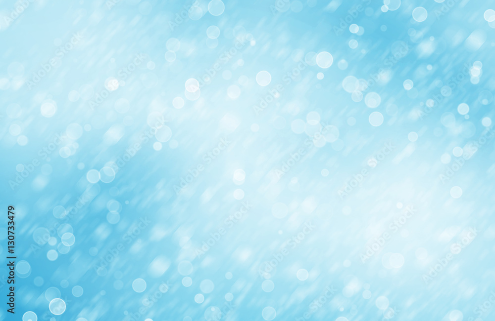 Background image with blue bokeh lights of snow