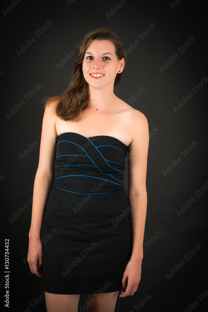 Beautiful woman doing different expressions in different sets of clothes: smile Beautiful woman doing different expressions in different sets of clothes: smile