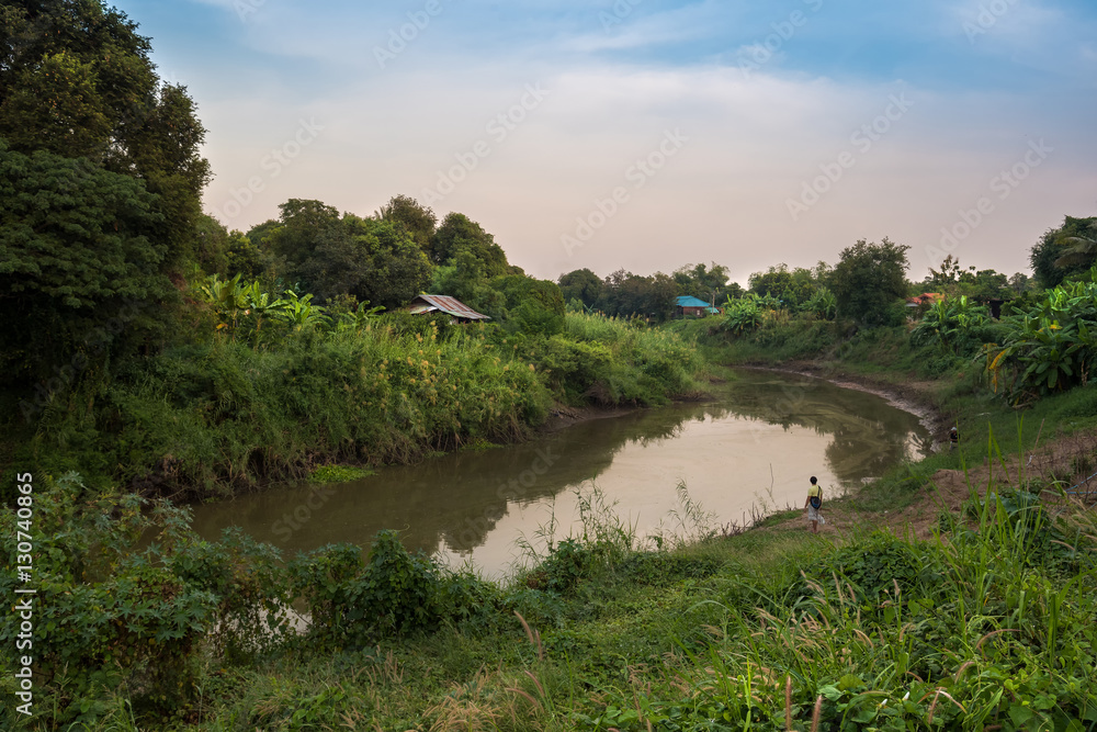 Two people is fishing near the river, Lopburi River, Singburi Two people is fishing near the river, Lopburi River, Singburi