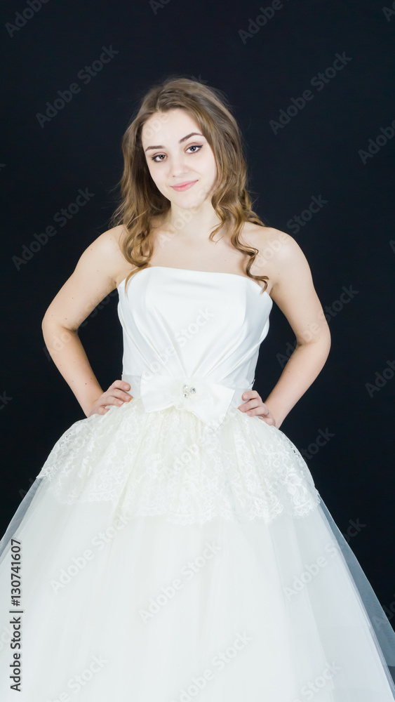 bride on black background. dress