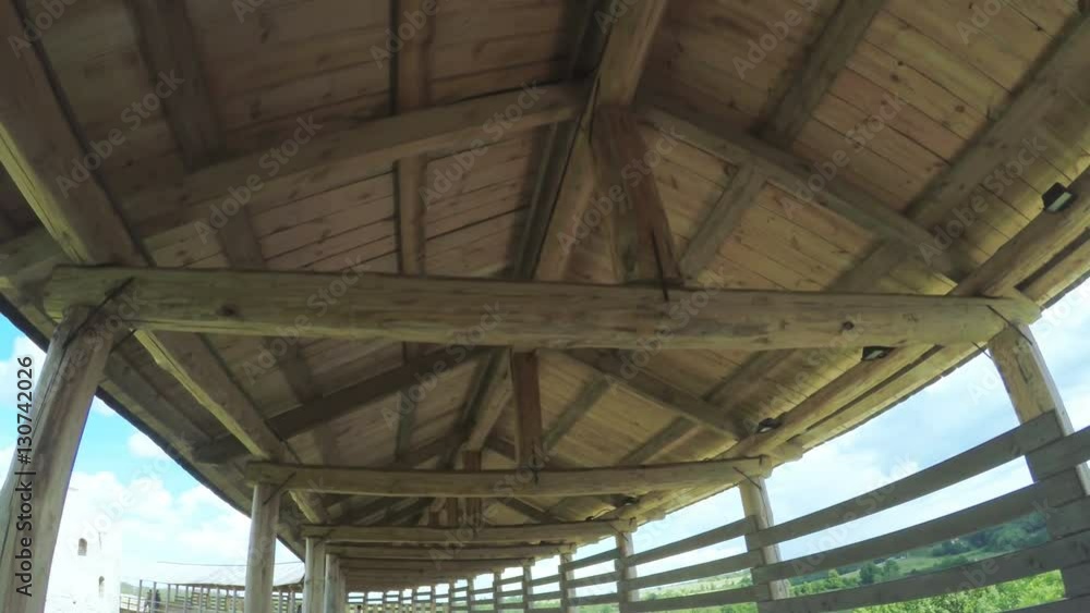 Wooden carport on castle wall Wooden carport on castle wall