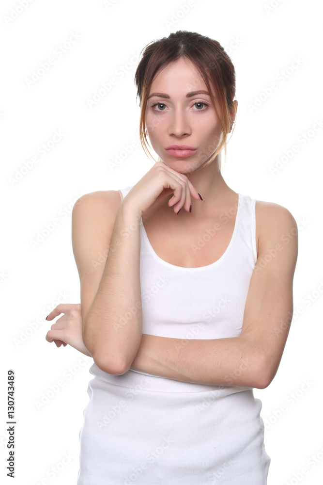 Woman in tanktop with crossed arms. Close up. White background Woman in tanktop with crossed arms. Close up. White background