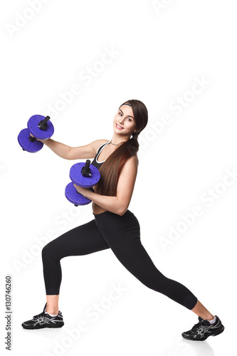 Athletic fitness woman helthy sport isolated white background black clothes with dumbbells
