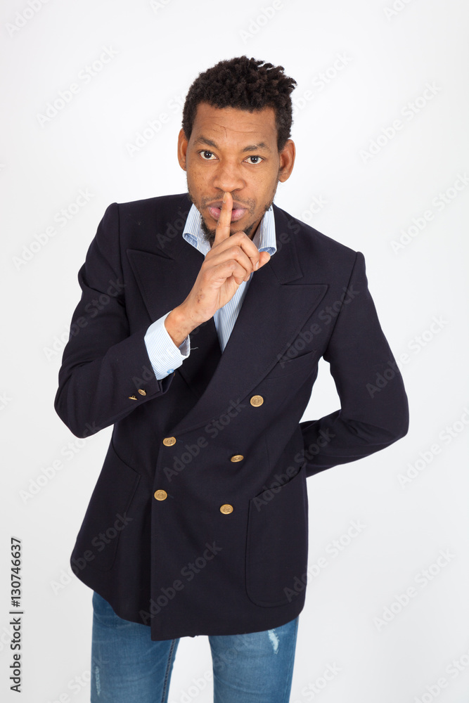 Handsome man doing different expressions in different sets of clothes: be quiet