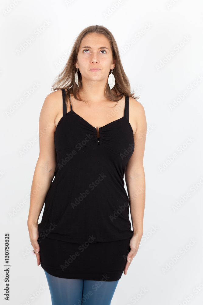Beautiful woman doing different expressions in different sets of clothes: at attention Beautiful woman doing different expressions in different sets of clothes: at attention