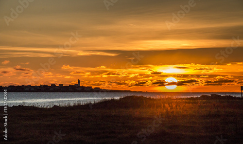 Sunset west coast lighthouse photo
