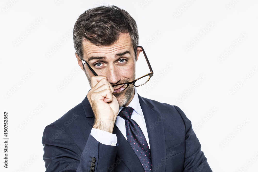 smiling middle aged businessman putting his eyeglasses for corporate vision smiling middle aged businessman putting his eyeglasses for corporate vision