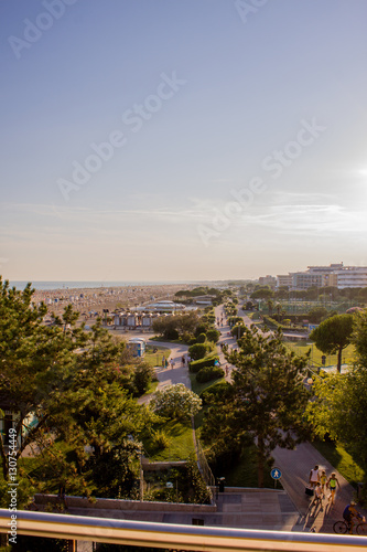 View of shore and city of Bibione, sunset.