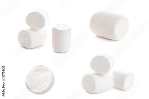 Fluffy white marshmallow macro isolated over white background. H