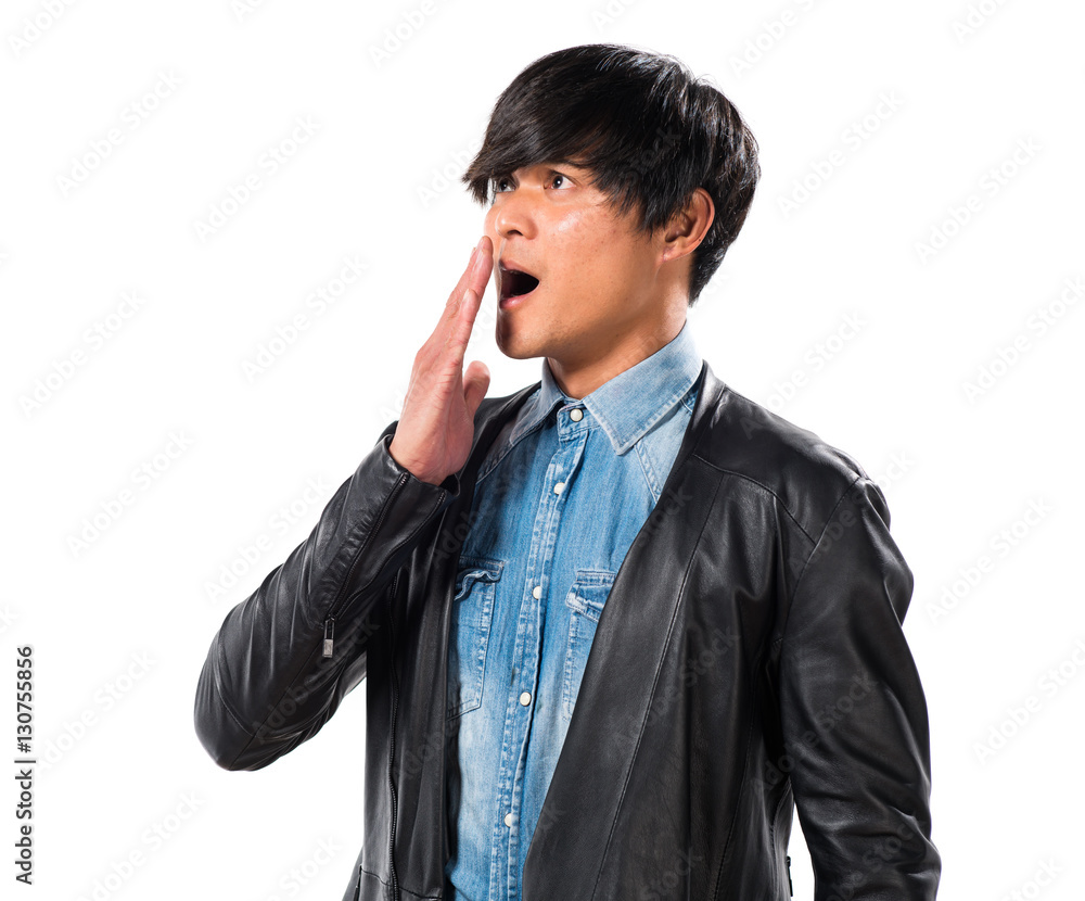 Asian handsome man yawning
