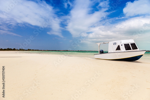 Beached boat in tropical bay