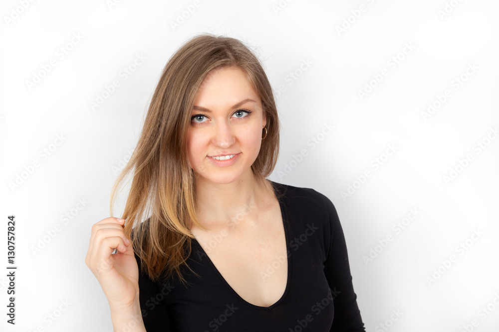 Young attractive woman smiling invitingly Young attractive woman smiling invitingly