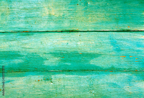 Green weathered wooden wall texture.