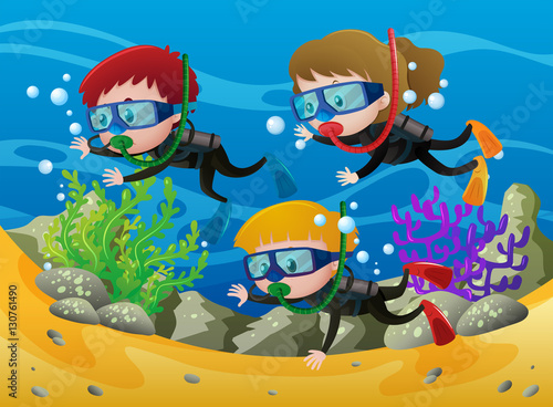 Three kids scuba diving under the sea © brgfx
