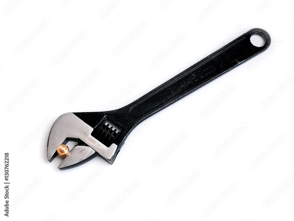 Obraz premium adjustable wrench and nut on white background